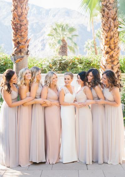 Blushing bride in Amy Kuschel's Lola wedding gown. Photo: Photography by Paulina, as seen on Style Me Pretty