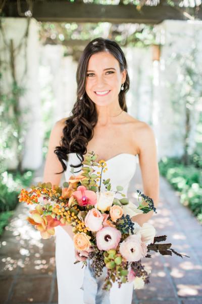 Bridal babe in Halston, silk crepe wedding gown by Amy Kuschel. Photo by Brooke Borough, as seen on Style Me Pretty