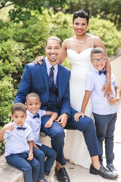 Family portrait for Marquita & Chester's vow renewal. Amy Kuschel Goldie wedding dress, made in San Francisco. Anny Photography.