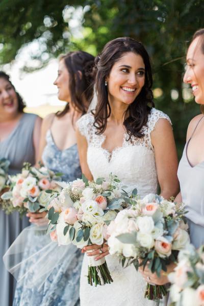 Allie in Avalon, an Amy Kuschel lace wedding gown. Photo: Vicki Plus Erik Photographers