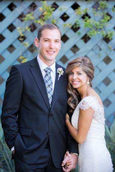 Amanda wears Amy Kuschel's lace wedding dress Rita, as seen on Style Me Pretty. Photography by Theo Milo.