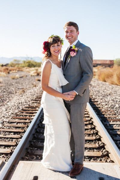 Poppy, an Amy Kuschel wedding dress, was perfect for this bride's rustic bohemian nuptials. Photography: Heather Curiel Weddings.