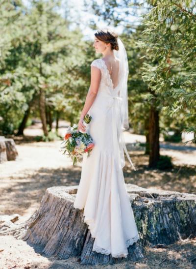 Coretta lace wedding gown by Amy Kuschel, made in San Francisco, California. Photo: Josh Gruetzmacher Photography