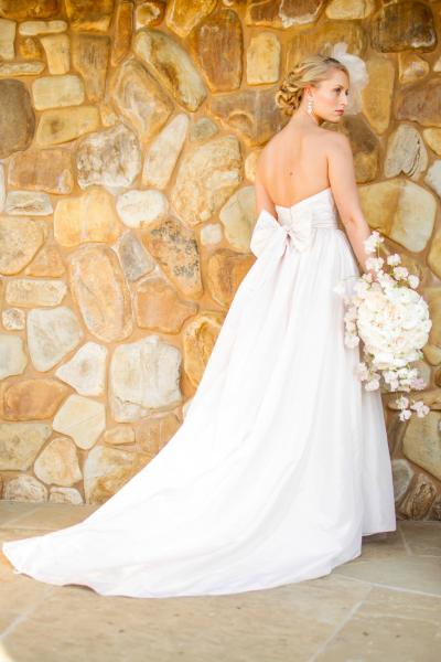 Austen in Petal Pink, a ballgown wedding dress by Amy Kuschel. Photographed at Devine Rance by Mike Larson.