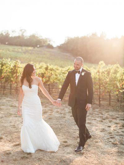 Bride wears Giorgia lace wedding gown, made in San Francisco by Amy Kuschel. Photo by Mallory Miya Photography