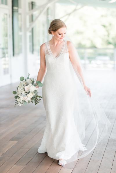 Bride wears Garbo lace wedding gown, made in San Francisco by Amy Kuschel. Photo by Audrey Rose Photography
