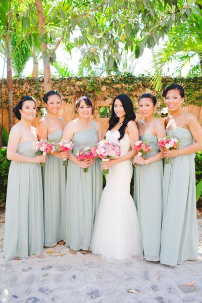 Christina and her bridesmaids in Puerto Vallerta, Mexico. Bride wears Amy Kuschel's Viva gown. Photo courtesy of Gladys Jem.