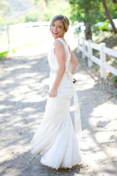 Christy is so charming in Laurel, an Amy Kuschel wedding gown in Rose Garden lace. Photography by Lauren Scotti.