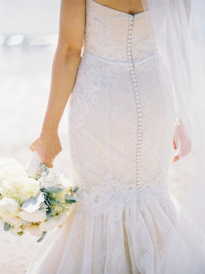 Giorgia's delicate Primrose lace and artfully placed French Alencon lace applique, complete with covered buttons. Photography: Jessica Burke.