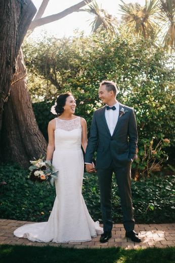 Bride wears Bardot, an Amy Kuschel lace wedding gown. Photography: Encarnacion Photography