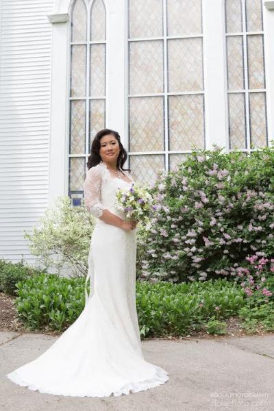 Esther exudes grace and extravagance in Rosemary's collage of lace and matching long sleeve lace shrug. Wedding dress and shrug by Amy Kuschel. Photography: DOLA Photography.