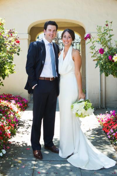 Francesca exudes elegance and luxe glamour in Amy Kuschel's Farrah wedding gown. 