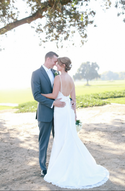 Elegant. Flirtatious. Romantic. Feminine. Amy Kuschel's lace wedding dress, Willow.