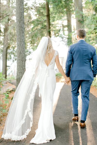 Bride wears Calistoga, an Amy Kuschel San Francisco wedding gown. Photo by Kayla Yestal