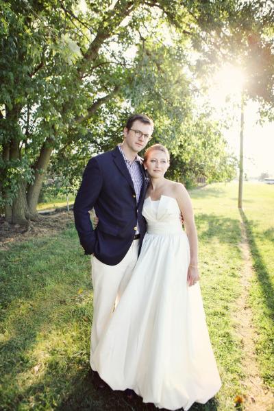The bride is playful yet sophisticated in Amy Kuschel's bellgown wedding gown Mimi. Photography: Amanda Julca. As seen on Style Me Pretty.