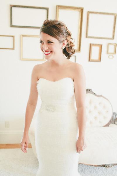 Jessica married in Amy Kuschel's Voila! wedding gown. Congratulations, Jessica and Chad! Photo credit: onelove photography.