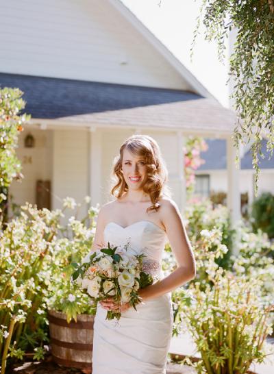 Bride Jessica said, "I Do" to Tom in Amy Kuschel's Tulip gown. Photo courtesy of Christina McNeill.