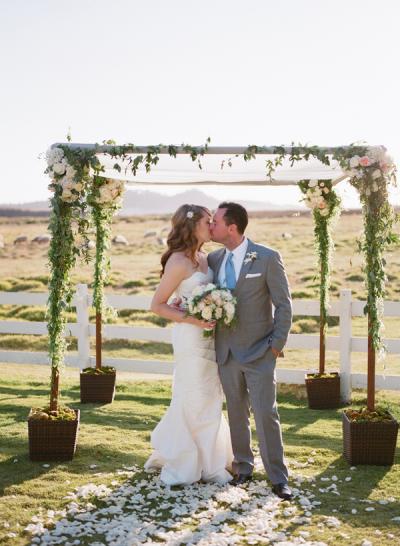 Congratulations, Jessica & Tom! Bride married in Amy Kuschel's Tulip gown. Photo courtesy of Christina McNeill.