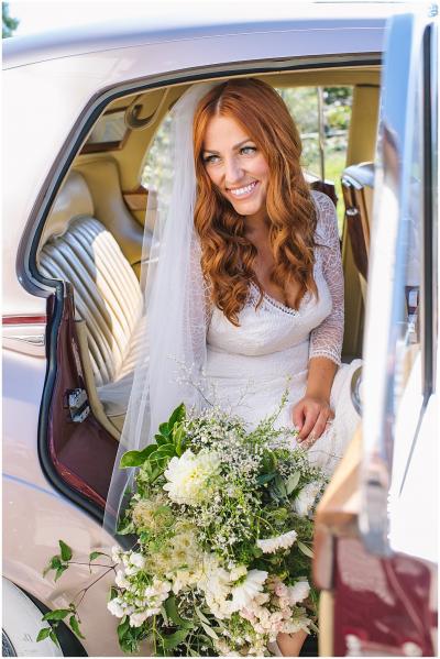 Gorgeous bride wearing Garbo, an Amy Kuschel lace wedding dress made in USA. Photography: Amanda Dumouchelle