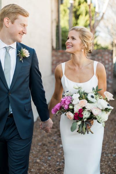 Kaitlin wears Amy Kuschel's Go Lovely wedding gown, made in San Francisco. Photo: Rustic White Photography