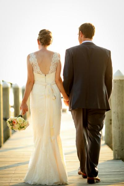 Love is walking hand-in-hand! Katelyn wears Amy Kuschel's Lauryn gown.