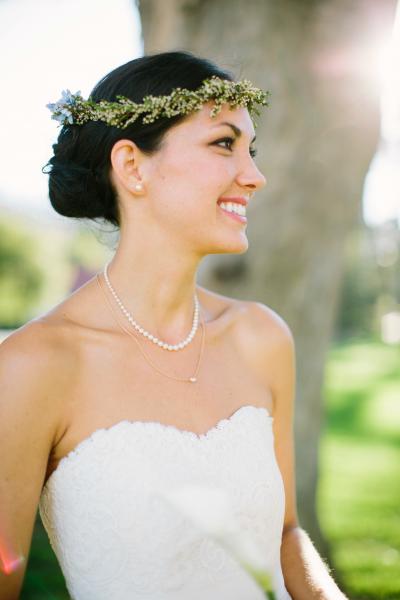 The Heritage Cotton lace of Lavender, an Amy Kuschel wedding gown, pairs beautifully with Katie's crown of baby's breath. Photography by Carmen Holt.