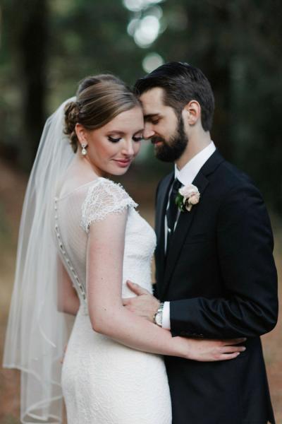 Katie is radiant in Starr, an Amy Kuschel lace wedding dress. Photography: Heather Elizabeth