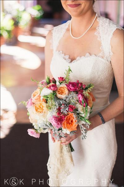 Kaylee wears Pearl's flattering trumpet silhouette delicately fabricated in Heirloom English Rose lace; an Amy Kuschel wedding dress. Photography by K&K Photography, www.kandkphotography.com.