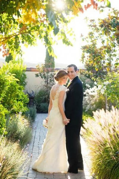 Elegant and glamorous in Rita, a trumpet style wedding dress by Amy Kuschel. 