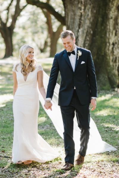 The bride said "I Do" in Amy Kuschel's Starr lace wedding dress. Photography: Sean Money + Elizabeth Fay.