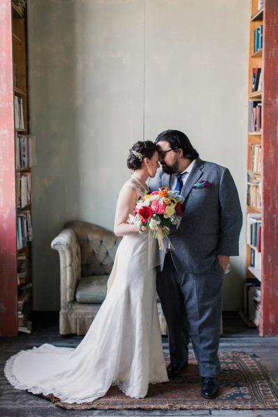 Liz brings the romance in Sierra's trumpet silhouette, an Amy Kuschel wedding gown. Photography by Mademoiselle Fiona.