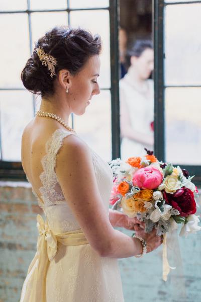 Liz is oh-so elegant in Amy Kuschel's lace wedding dress, Sierra. Photography by Mademoiselle Fiona.