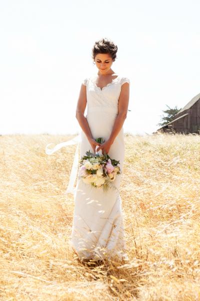 Classic, elegant, and oh-so beautiful in Amy Kuschel's Coretta lace wedding dress.