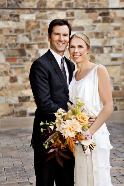Congratulations, Meredith and Chris! Bride wears Amy Kuschel's Poppy gown. Photo courtesy of Pepper Nix Photography.