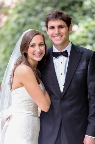 Mollie wears Amy Kuschel's Kennedy gown. Congratulations, Mollie and Paul!
