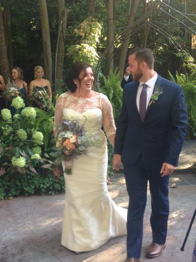 Bride wears Sugar wedding gown and Cherry lace topper by Amy Kuschel San Francisco