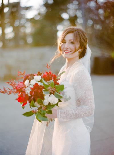 Bride wears Amy Kuschel's Garbo lace wedding gown. Photo: Amanda Crean