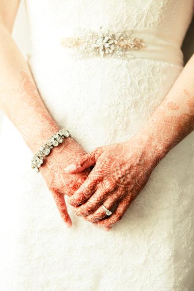 Amy Kuschel's Rita wedding gown worn by Molly with Henna hands.