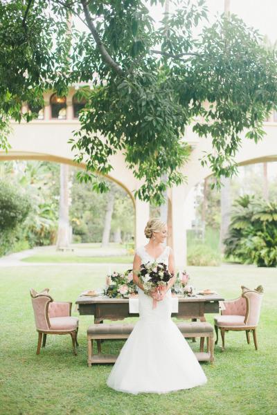 Amy Kuschel's Sabrina "Takes the Plunge" styled by WINK! Weddings. Photo courtesy of Onelove Photography. As seen on Style Me Pretty.