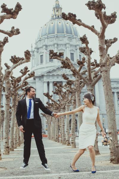 Cause a stir at San Francisco City Hall in Amy Kuschel's chic lace sheath wedding dress Olive. Photography: IQ Photo.