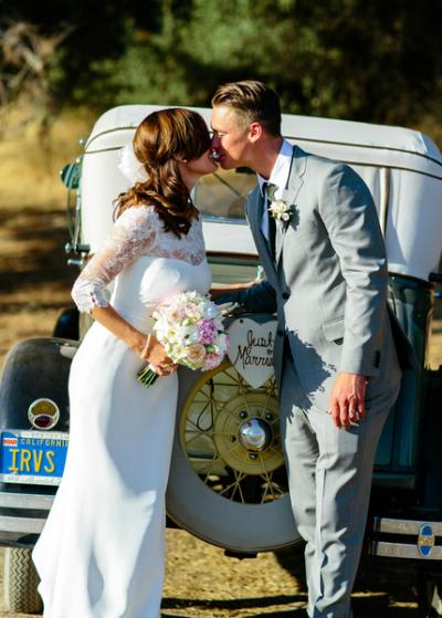 Stylish with a vintage nod. Bride married in Audrey's lace and crepe sheath silhouette, wedding dress by Amy Kuschel. Photography: Claire Dobson Photography.