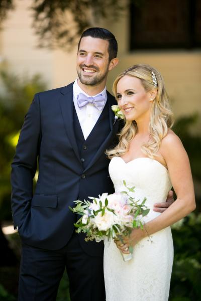 Bride wears Cassidy lace wedding gown, made in San Francisco by Amy Kuschel. Photo by Allyson Wiley Photography