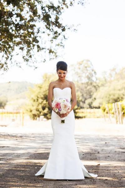 A beautiful pastel wedding bouquet. The bride wed in Amy Kuschel's Brooke wedding gown.