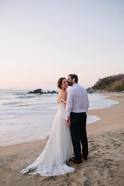 Bride wears Marina, a silk chiffon Amy Kuschel wedding gown. Photography: Taryn Baxter