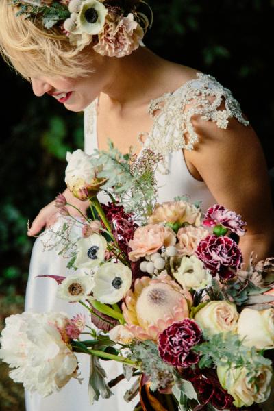 Teresa is just stunning in Amy Kuschel's Avedon wedding gown. Florals: Natasha Kolenko. Photography: The Melidoes.