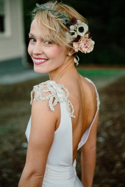Teresa is AMAZING in our Avedon gown. Florals: Natasha Kolenko. Photography: The Melidoes.