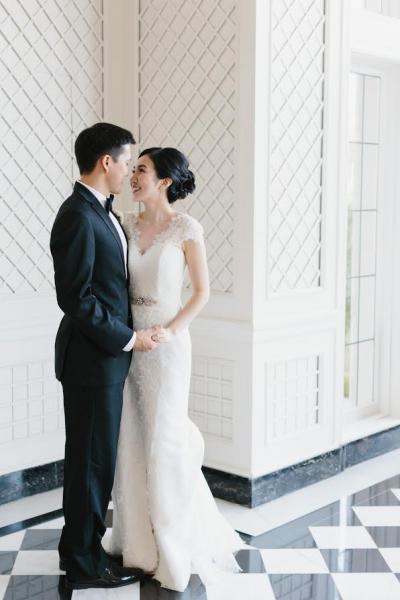 Bride wears Rita, a lace wedding dress made in San Francisco by Amy Kuschel. Photo by Mae Stier Photography