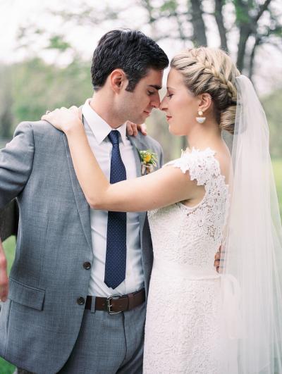 Bride wears Babe, a lace wedding dress made in San Francisco by Amy Kuschel. Photo by Renee Hollingshead Photography