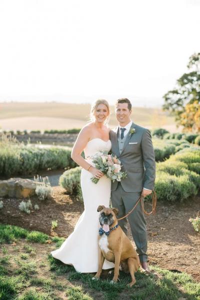 Bride wears Lennon, an Amy Kuschel wedding dress