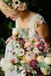 Teresa is just stunning in Amy Kuschel's Avedon wedding gown. Florals: Natasha Kolenko. Photography: The Melidoes.